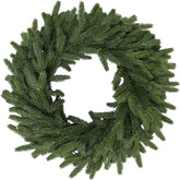 LZNPA wreath on front door showcasing realistic droopy cedar look and curb appeal