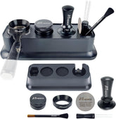 M MEWCO front view of tamper station showing organized espresso tools and tidy countertop