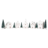 Mark Feldstein front view of village set showing lit buildings and cohesive winter scene