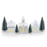 Mark Feldstein porcelain village front display showing whole set and cozy glow