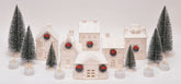 Mark Feldstein village front view showing six buildings and warm glow benefit