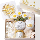 MAYICIVO gift box front view showing elegant daisy embossing and gold foil