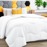 MEELUS front view comforter on bed showing neat finish and inviting comfort