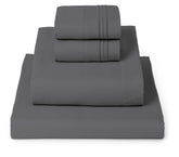 Mellanni folded full set on bed showing neat stack and immediate comfort