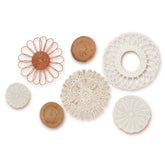 MeraMera front view of seven-piece rattan flower set showing natural finish and arrangement benefit