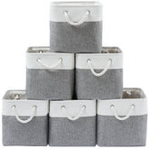 MidmmVick front view of six white and grey fabric cubes providing uniform storage