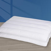 MINUPWELL front view of two-pack pillows showing compact packaging and quick setup benefit