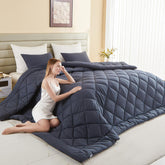 MIOTO front view of oversized grey comforter showing full bed coverage and cozy appearance
