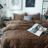 mixinni front view of queen comforter showing leopard print and bold bedroom update