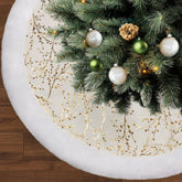 MNKXL front view of white and gold tree skirt showing full coverage and elegance