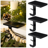 MorningRo front view of three black stocking holders showing clean silhouette and stability