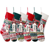 Mostop front view on mantel showing six stockings and festive cohesion