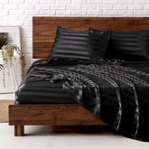 MR&HM front packaging showing black striped queen sheet benefits