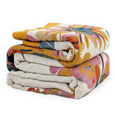 MSGKV throw front view showing sunflower birds and butterfly pattern and bold boho style