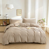 Mucalis front view of tan gingham duvet cover showcasing plaid and fit