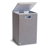 Munchkin front view grey hamper showing neat nursery storage benefit