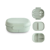 mushie front view of sage lunchbox showing compact benefit