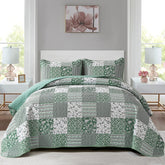 Mybedsoul quilt front view showing green patchwork and cozy appeal