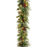 National Tree Company 9ft garland front view showing full-length realistic fir and pine cones for instant festive curb appeal