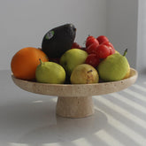 Nawgnail travertine bowl front view showing shape and natural appeal