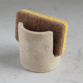 Nawgnail travertine front view showing compact sink caddy and neat organization benefit