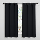 NICETOWN front view of two panels showing modern black grommet-top and full coverage