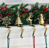 NIGHT-GRING front view showing four themed stocking hooks adding festive charm
