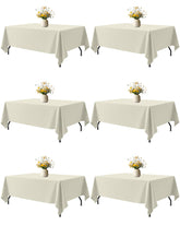 Niuara ivory front view showing full table coverage and elegant drape