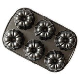 Nordic Ware Bundtlette front view showing six-cup layout and elegant finish