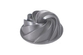 Nordic Ware front view Heritage Bundt showcasing sculptural swirl and even browning