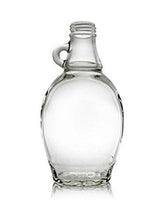 North Mountain Supply glass bottle front view showcasing amber syrup and premium presentation