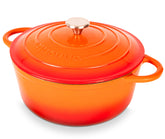 nuovva front view of orange Dutch oven showing full pot and lid, stylish serving