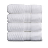 NY Loft front view of four white bath towels showing neat packaging and value