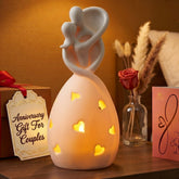 OakiWay front view of Infinity Love holder showing silhouette and warm ambiance
