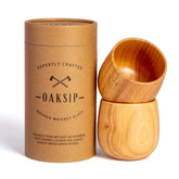 Oaksip wooden bourbon glass front view showing finished oak and sturdy base benefit