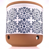 Okavango garlic keeper front view shows terracotta jar and tidy countertop storage benefit