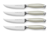 Oneida stainless steel front packaging showing set of four knives and metallic finish benefit