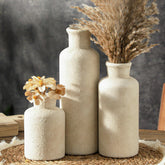 ooit front view of three whitewashed vases showing coordinated neutral decor