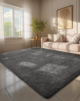 Ophanie 6x9 front view showing plush gray pile and modern look