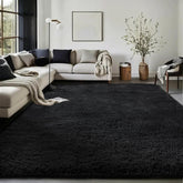 Ophanie black rug front view showing neat edges and plush surface for style