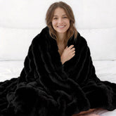 Opulapel black throw front view showing plush luxury and sofa styling benefit