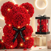 Otlonpe rose bear front in clear box showing elegant presentation and gift-ready look