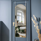 Otlsh gold arch mirror front view showing full-length reflection and elegant style