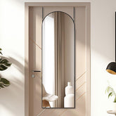 Otlsh arch mirror front view showing full-length reflection and sleek black frame benefit