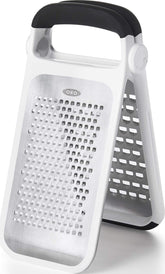 OXO front view of two-fold grater showing dual stainless faces and handle for versatile use