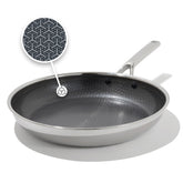OXO Hybrid 12" front view showing mirror-polished tri-ply finish and broad cooking surface benefit