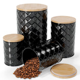Pebble & Stem front view of four black canisters showing farmhouse style and organized storage