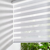 Persilux front view of white zebra blinds showing clean appearance and benefit light control