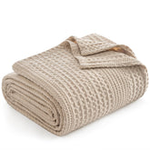 PHF blanket front flat lay in light tan showing full queen coverage and neat drape