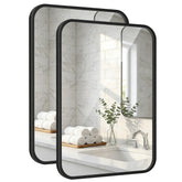 Pocetry front view of paired 24x36 mirrors showing clean symmetry and style